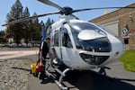 Paul Pearlmutter, a flight respiratory therapist with AirLink, prepares the air ambulance in Bend on May 30, 2025.