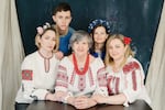 Oregon Stands With Ukraine, which is providing humanitarian aid, began with Evghenia Sincariuc (first row, right). Pictured beside is her mother-in-law Olga Safina (middle) and friend Olena Pasyvenko. Standing behind them are Olena's son Glib Pasivenko and Evghenia's daughter, Alisa Safina. They are wearing traditional Ukrainian vyshivanka.