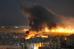 Flames and smoke rise form an Israeli airstrike on Dahiyeh, in the southern suburb of Beirut, Lebanon, on Sunday.