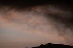 Smoke from wildfires hangs in the sky over Griffith Observatory on Jan. 8, 2025, in Los Angeles.