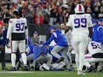 Buffalo Bills' Damar Hamlin is examined during the first half of an NFL football game against the Cincinnati Bengals on Monday in Cincinnati.