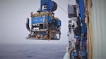 In this video still, the ROV Jason is being launched on Tuesday, June 28, 2022. It will descend about a mile below the ocean surface to the Axial Seamount.