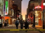 Police cordon off the area around the site of the overnight attack in the French Quarter of New Orleans.