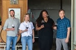Tiquette Bramlett made history last year by becoming the first Black woman appointed to oversee a winery in a major U.S. wine region. Compris Vineyard (formally Vidon) hired her as their president in 2021. The team also includes, from left, winemaker David Bellows, co-owner Erin Allen, and co-owner Dru Allen.