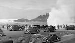 A provided photo from the Oregon Historical Society shows the Spouting Horn at Depoe Bay, Ore., in August 1939. Oregon's Highway 101, which turns 100 this year, brought new opportunities for industry and tourism to coastal communities. (OHS Research Library, OrHi 57495)