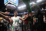 Ruthy Hebard high-fives fans as she heads to the locker room following the Oregon Ducks' win over South Dakota State in the Sweet 16 Friday, March 29, 2019.