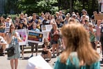 The crowd listens on as Oregon Democratic state Rep. Sheri Malstrom speaks out against Trump administration immigration policies.