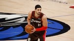 Portland Trail Blazers center Enes Kanter (11) prepares to pass the ball during the second half of an NBA basketball game in Dallas, Sunday, Feb. 14, 2021.