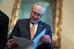 Senate Majority Leader Chuck Schumer, D-N.Y., looks over his notes during a meeting with Ukraine's Prime Minister Denys Shmyhal as Congress moves to advance an emergency foreign aid package for Israel, Ukraine and Taiwan, at the Capitol in Washington, Thursday, April 18, 2024.