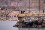 Migrants return to Morocco from the Spanish enclave of Ceuta, Saturday, Aug. 1, 2026.