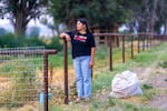 Alejandra Hernandez prepares to deliver a bag of donated clothes to agricultural workers in Hammett, Idaho. The clothes are intended to help the farmworkers deal with the record-breaking high temperatures in Idaho this summer. Hernandez is one of the founders of Latinx Farmworkers of Southern Idaho, part of the Idaho Immigrant Resource Alliance, which raises money to buy cooling and hydrating items for farmworkers.