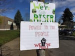 Opponents of a Portland Public Schools' decision to suspend teacher Chris Riser posted protest signs after an Apr. 2 2018 demonstration.