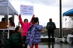 Allies and members of Yakama Nation hold a rally at the Vancouver Landing Amphitheater along the Columbia River.