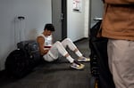 Deni Avdija, small forward for the Portland Trail Blazers, looks at his phone before a press conference at the Portland Trail Blazers Media Day at the Moda Center in Portland, Ore., on Sept. 28, 2026.