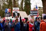 Marchers held signs addressing issues from science to women's rights.