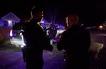 Officer Michael Terrett, right, talks with another officer after recovering a stolen pickup truck in southeast Portland during a November 2024 mission. The Portland Police Bureau has been tracking more granular detail about stolen vehicles to improve their ability to find and catch them.