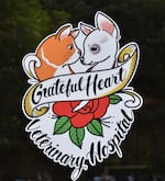 The logo of Grateful Heart has the faces of two pets who belonged to nurse DeeDee Remington and Dr. Katy Felton. Felton says Grateful Heart’s logo was designed with Portland's tattoo culture in mind.