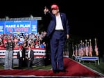 Republican presidential candidate former President Donald Trump gestures after speaking at a campaign rally at Trump National Doral Miami on Tuesday.