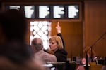 House Majority Leader Jennifer Williamson, D-Portland, signals her vote on the House floor at the Capitol in Salem, Ore., Tuesday, April 2, 2019.