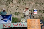Retired wildlife biologist Raymond Skiles, who spent decades at Big Bend National Park, leads protesters in chanting “No Big Bend Wall.”