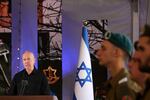 Israel's Defense Minister Yoav Gallant speaks during a ceremony marking the Hebrew calendar anniversary of the Hamas attack on October 7 last year that sparked the ongoing war in Gaza, at the Mount Herzl military cemetery in Jerusalem, Israel Sunday Oct. 27, 2024.