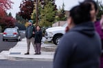 Parents and community members keep watch for ICE near J.W. Poynter Middle School in Hillsboro.