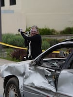 EOU President Kelly Ryan gears up to hit a vehicle as part of the university's annual "Car Smash" on June 3, 2026.