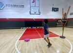 A student plays basketball at the Blazers Club in Northeast Portland, one of the Portland Boys & Girls Club sites. Officials with the Boys & Girls Club of Portland want the space to be a community hub, where students can safely spend time and have access to meals while schools are closed.