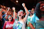 Supporters of New York congressional candidate Claire Valdez celebrate as she is announced the winner of her race during her primary night watch party in New York City.