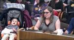 Nikki Monaco and her son Emmett present to a public hearing in Salem.
“If we had screened him at birth, we could have treated him at birth and he would have had a much better outcome," said Monaco.