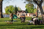 John Parke and Tiffany Deen are among about 20 unhoused people who regularly sleep at Foster Park, the small space in the center of Clarkston that the city designated for camping.