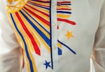 Ric Decatoria wears taditional Filipino costume, made from pineapple fibers.