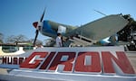 A tourist watches at Playa Giron Museum a British-made Hawker Sea Fury airplane that saw action in the Bay of Pigs combats 50 years ago, at Bay of Pigs, Matanzas province,