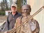 Artist Pete Helzer with his bronze statue of Oregon Black pioneer Louis Southworth. The statue will be the centerpiece of a park named in Southworth's honor in Waldport. Photographed Oct. 12, 2022.