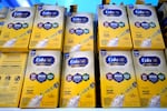 FILE - Infant formula is stacked on a table during a baby formula drive to help with the shortage May 14, 2022, in Houston. 
