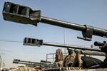 A fighter from the Qassam Brigades, the armed wing of the Hamas movement, is pictured amid long-range 50-caliber sniper rifles during an anti-Israel military show in Khan Yunis, in the southern Gaza Strip, Nov. 11, 2019.