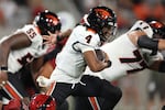 Oregon State quarterback Gevani McCoy (4) scrambles out of the pocket against San Diego State during the second half of an NCAA college football game Saturday, Sept. 7, 2024, in San Diego. Oregon State won 21-0.