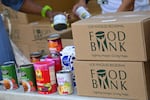 The Los Angeles Regional Food Bank provided boxes of groceries for a food giveaway in August. Food insecurity is expected to increase as government assistance programs are scaled back.
