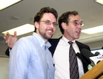 FILE-Portland attorney Brandon Mayfield, left, shares a smile with public defender Steven Wax as they announce in Portland, Ore., Monday, May 24, 2004, that a federal judge dismissed the case against Mayfield, who had been arrested in the Madrid train bombings investigation.