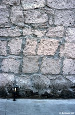 These bricks, found in downtown Bend, weren't molded: they were quarried from Tumalo tuff. The chisel marks from the people who mined them are still present.