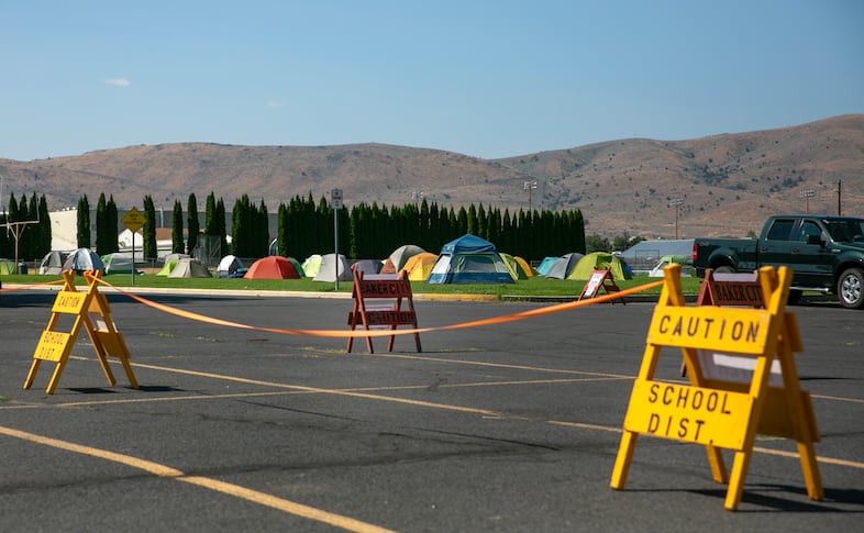 Personnel tents set up behind Baker City High School, where personnel from the Rocky Mountain Complex Incident Management Team 2 were brought in to fight the Badland Complex fires.
