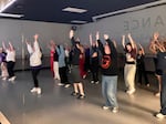 People dance during the dance class fundraiser, where about 50 people attended.
