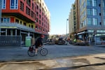 A cyclist rides through the new Vancouver waterfront.