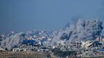 This picture taken from southern Israel near the border with the Gaza Strip shows smoke billowing following an Israeli strike on the Palestinian territory on Tuesday.