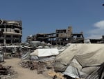 Tents stand amid the rubble of destroyed homes in al-Shujaiya, Gaza Strip, where displaced families endure harsh living conditions inside a new orange zone with nowhere else to go, on May 31.