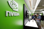 FILE - People take a look to Nvidia''s new products during the Computex 2025 exhibition in Taipei, Taiwan, Wednesday, May 21, 2025.