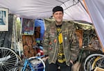 Niles stands in his structure near the Vera Katz Eastbank Esplanade in Southeast Portland in March 2024. Niles says he's never felt unsafe at the park, despite a number of recent attacks.