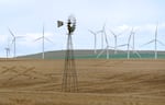 A windmill, with wind turbines from the Wheatridge Renewable Energy Facility, in May. Portland General Electric partnered with NextEra Energy Resources to build a first-of-its-kind facility that will use an innovative battery technology that supporters are calling a “game changer” for Oregon’s renewable energy transition.