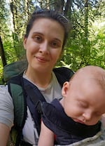 In this courtesy image, Rachel Pozgay-Brooks takes her young kid on a walk at a park near their home in Chehalis, Wash. in June 2026. Pozgay-Brooks lives in Washington's battleground 3rd Congressional District.