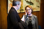 Oregon Attorney General Ellen Rosenblum waits for the start of Oregon Gov. Kate Brown's inaugural address at the state Capitol in Salem, Ore., Monday, Jan. 14, 2019.